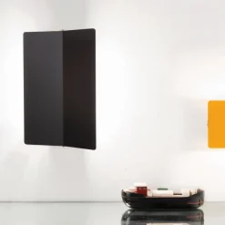 Applique à volet pivotant plié